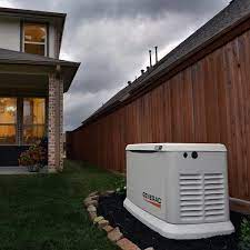 Atlanta neighborhood during power outage with one home powered by a standby generator